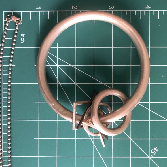 Necklace, earrings and bangle with free-floating geometric shapes as charms - Picture 5 of 12